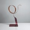 sculpture métal ruban torsadé rouge et orange