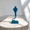 sculpture abstraite serpent en métal bleu turquoise