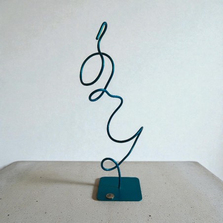 Création et fabrication artisanale en France. Sculpture abstraite en métal NaguraDesign, couleur bleu turquoise. 48X15X15 cm.