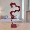 sculpture abstraite métal rouge