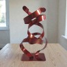 sculpture abstraite couleur cuivre