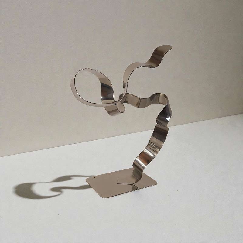 sculpture métal ruban torsadé chrome