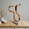 sculpture orange metal  et pierre